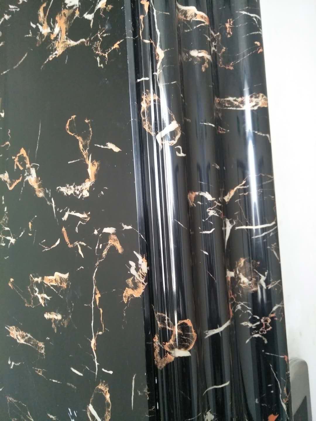 新型仿大理石电梯门套效果